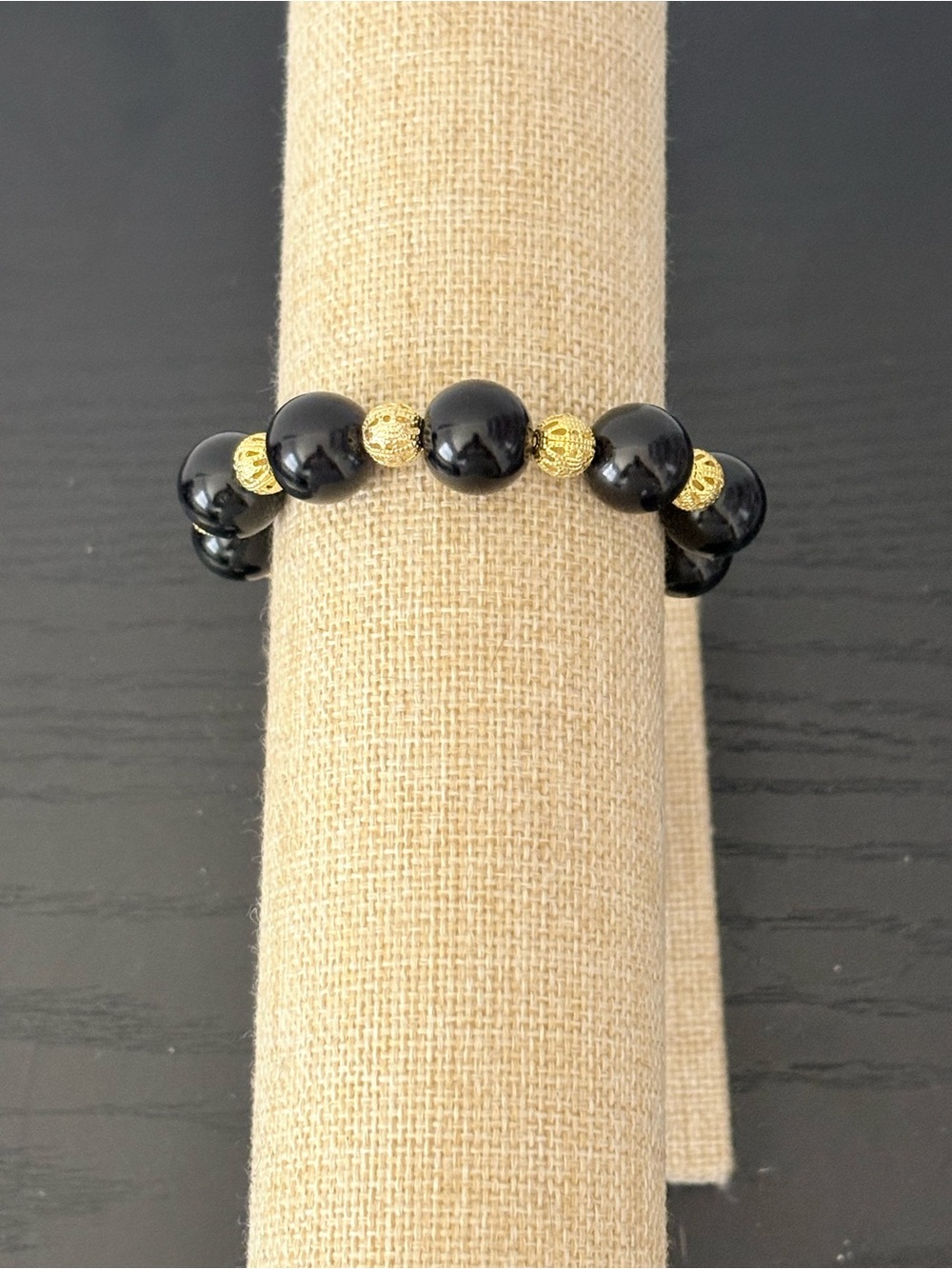 Handcrafted black glass pearl with gold round filigree beaded bracelet